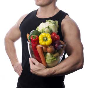 Sportsmen wearing fruit and vegetables